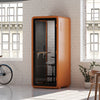 Quell Acoustic Soundproof Plus pod in orange, modern office room and workspace