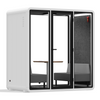 Quell Demi Plus soundproof booth by Soundbox Store – self-assembly in progress, two people building the pod frame